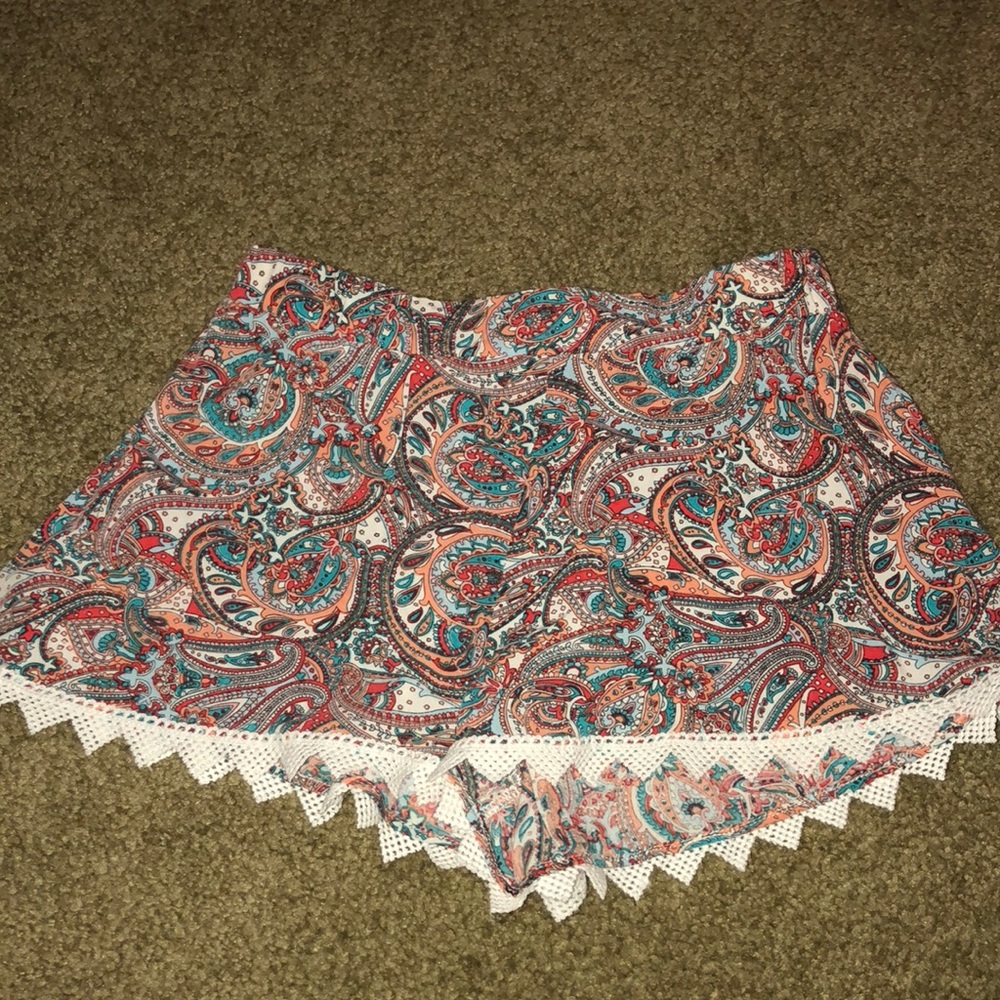 patterned flowy short with crochet detailing